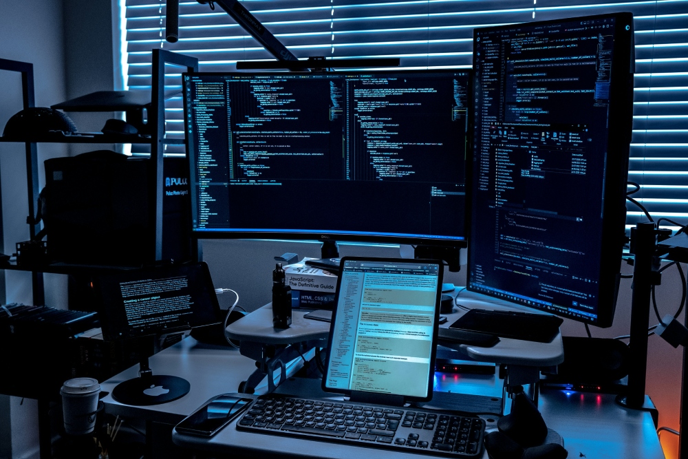 Cybersecurity professional monitoring network security in Gaithersburg, MD office